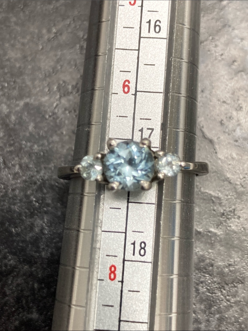 Three-Stone Silver Ring with Light Blue Center Stone